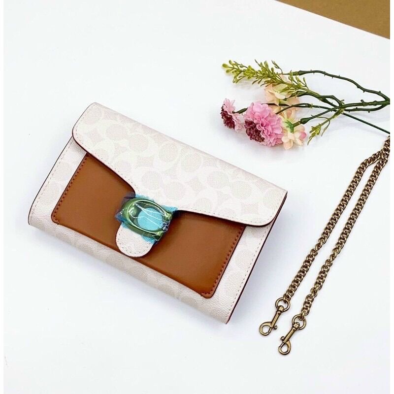 Túi đeo chéo kiêm clutch C0 ach tabby