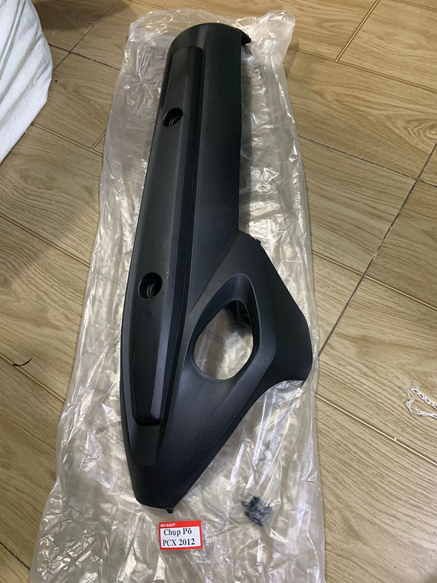 Ốp pô xe PCX đời 2012 giả zin