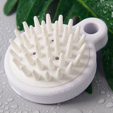 Lược gội đầu silicone muji